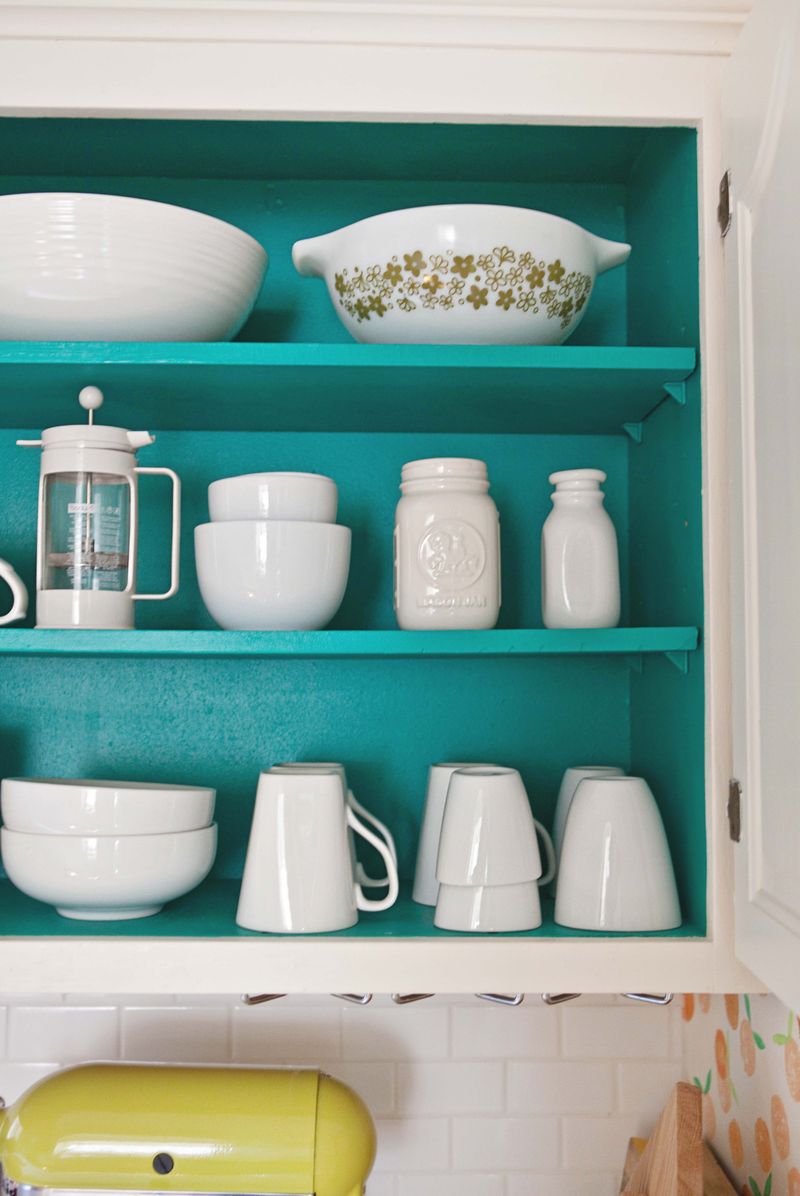 A pop of color inside the cabinets (click though for more details!) 