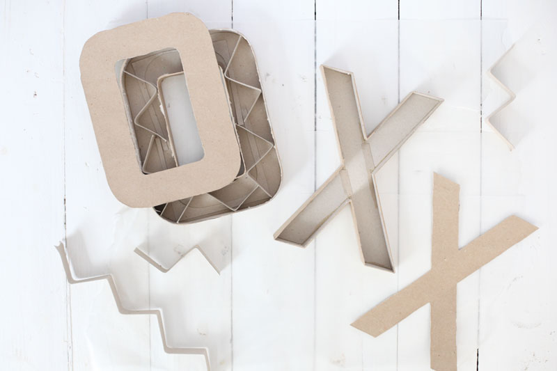 Make these concrete letter candlestick holders for a centerpiece at a party or wedding. Click through for dos & don'ts of forming concrete.