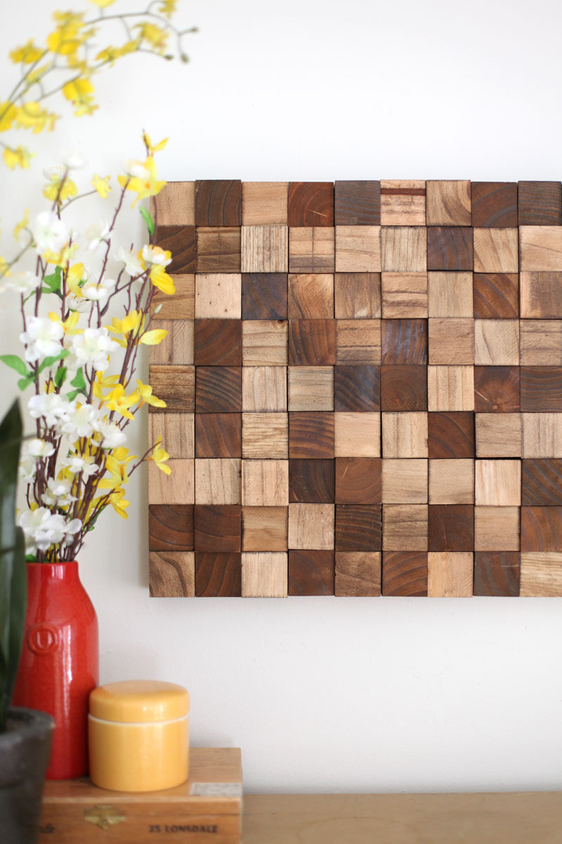 Create this wooden mosaic wall art with simple supplies you can find at the craft store! Click through for instructions.
