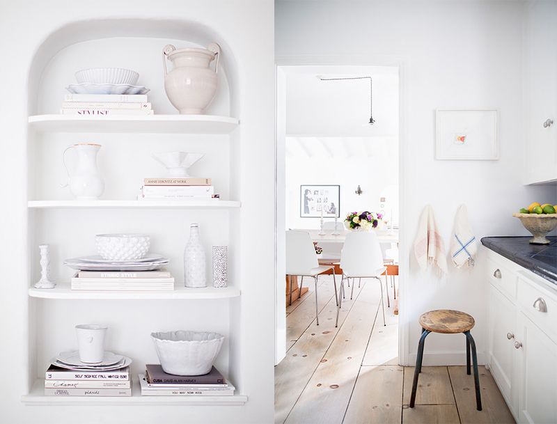 LOVE the white dishes and walls in this space