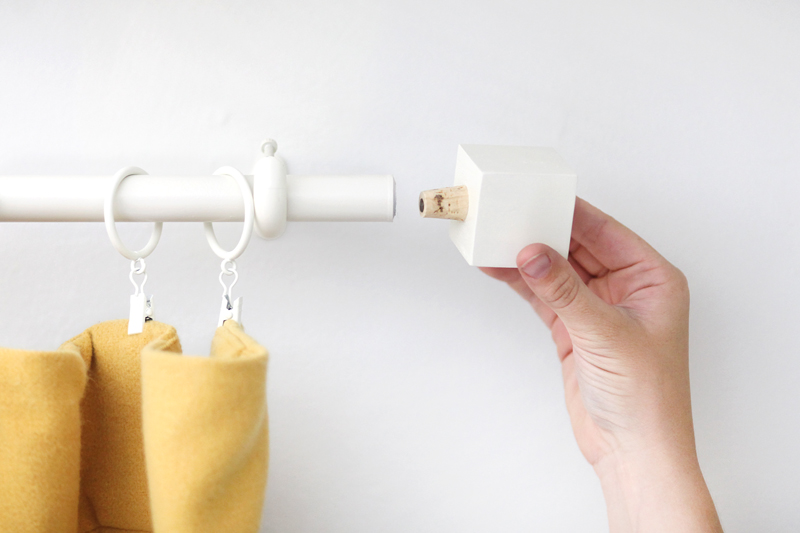 Save your dollars for drapes with this budget curtain rod and finial DIY!