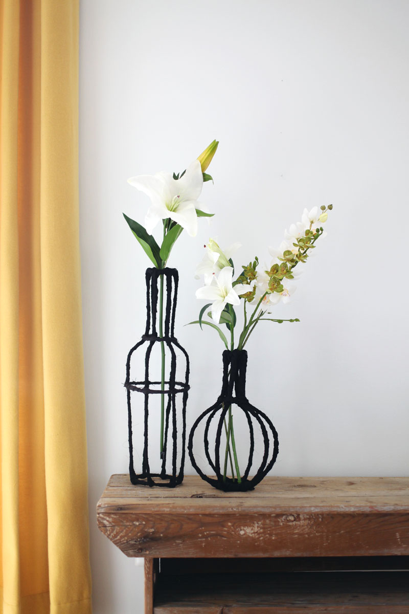 Turn some wire and scrap fabric into beautiful decorative vases for your home! Click through for instructions.
