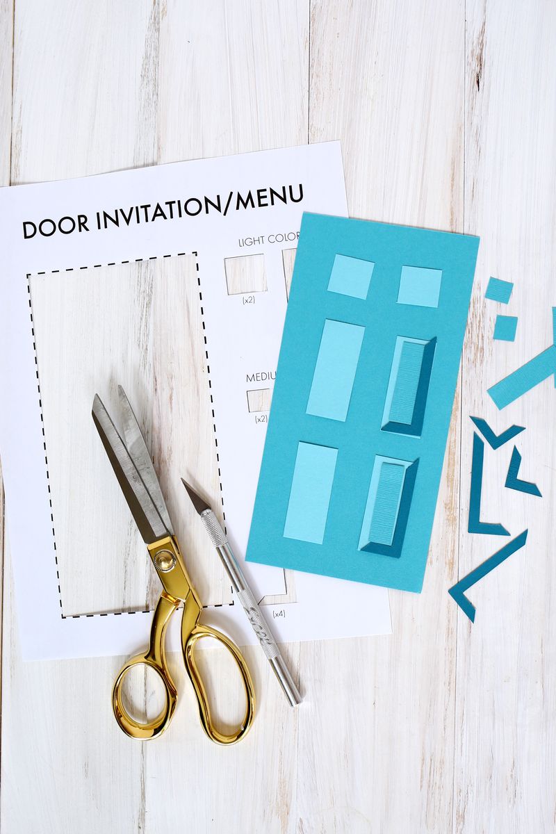 Make your own paper door for a party invite or menu (click through for template) 