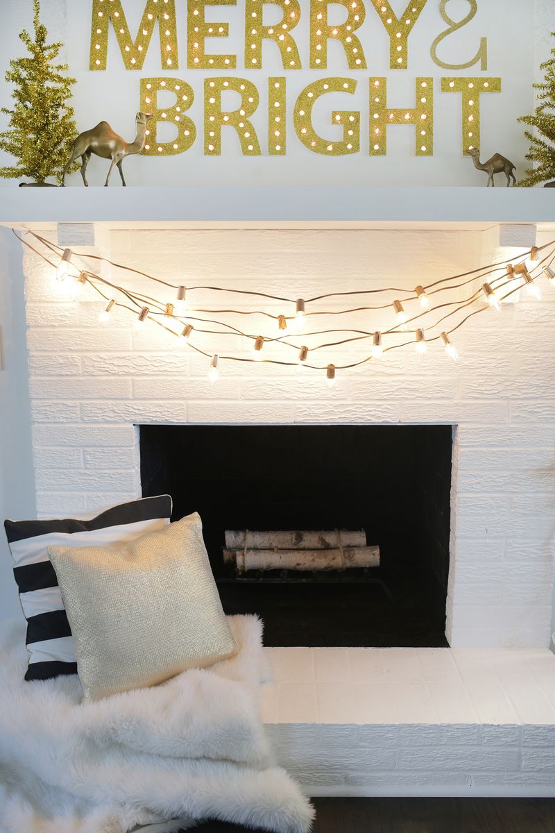 Spray paint light cords gold for a festive look! (click through for more)