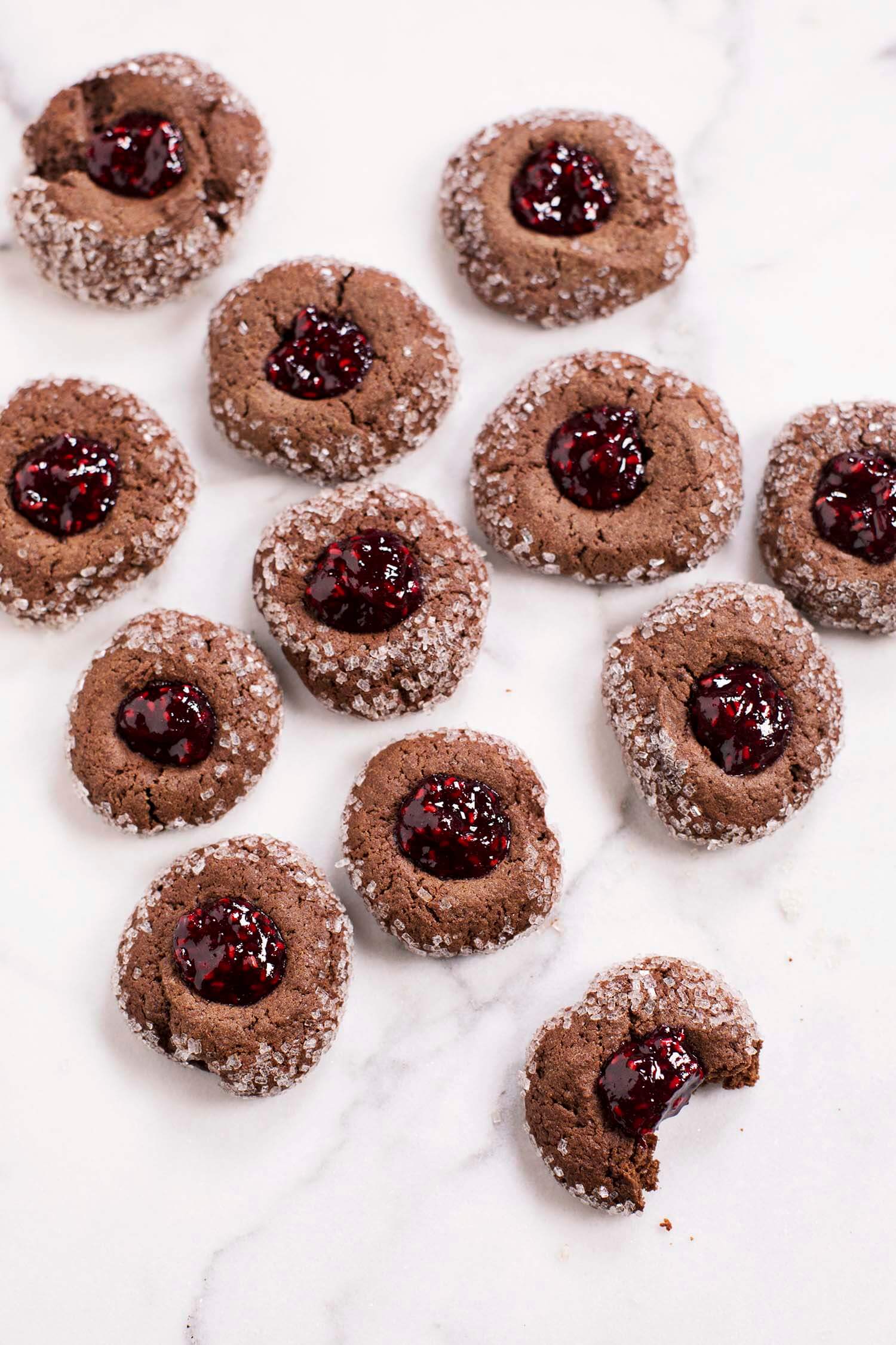 Chocolate thumbprint cookies with red wine raspberry jam (via abeautifulmess.com)