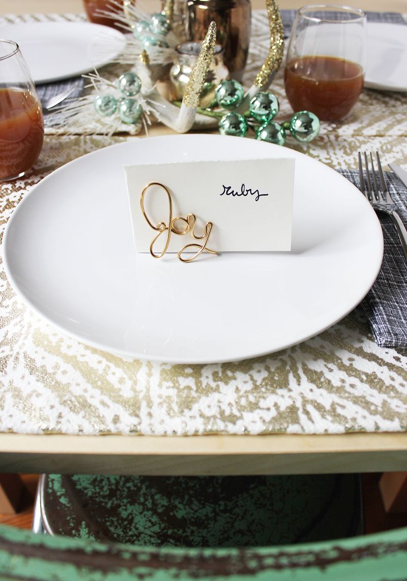Try these easy wire placecard holders for your next holiday gathering. Get the tutorial on www.ABeautifulMess.com today
