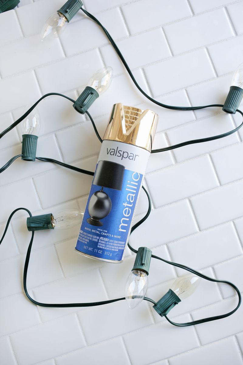 Spray paint light cords gold for a festive look! (click through for more) 