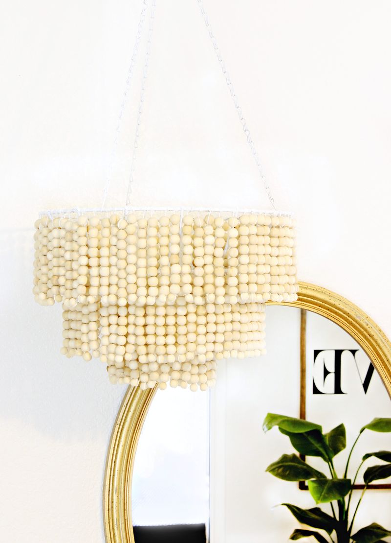 Love this DIY Wood Bead Chandelier - Click for tutorial 