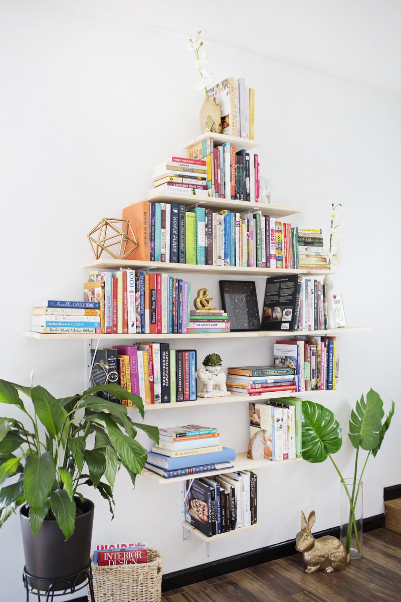 DIY Diamond Shaped Book Shelves (via abeautifulmess.com)