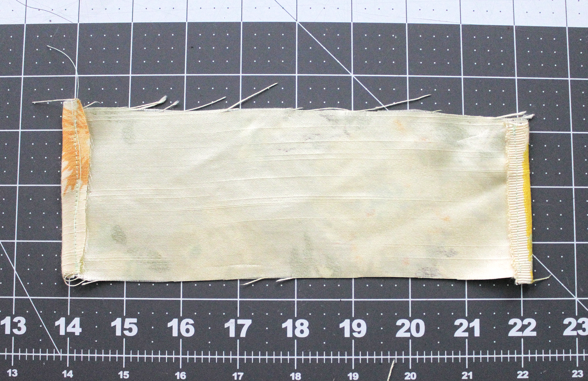 Step 7- fold down edges and stitch in place