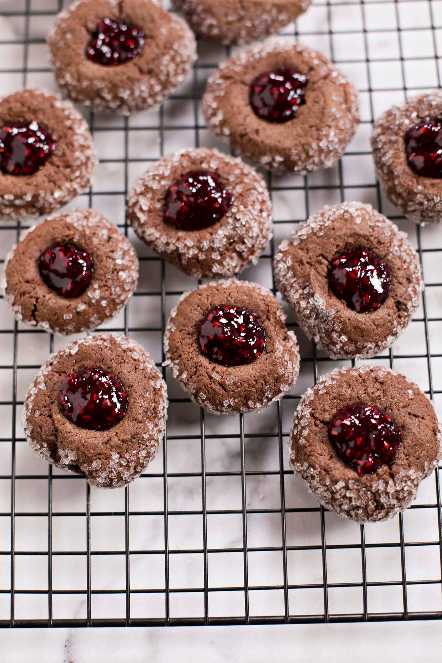 Chocolate thumbprint cookies with red wine raspberry jam (via abeautifulmess.com) 