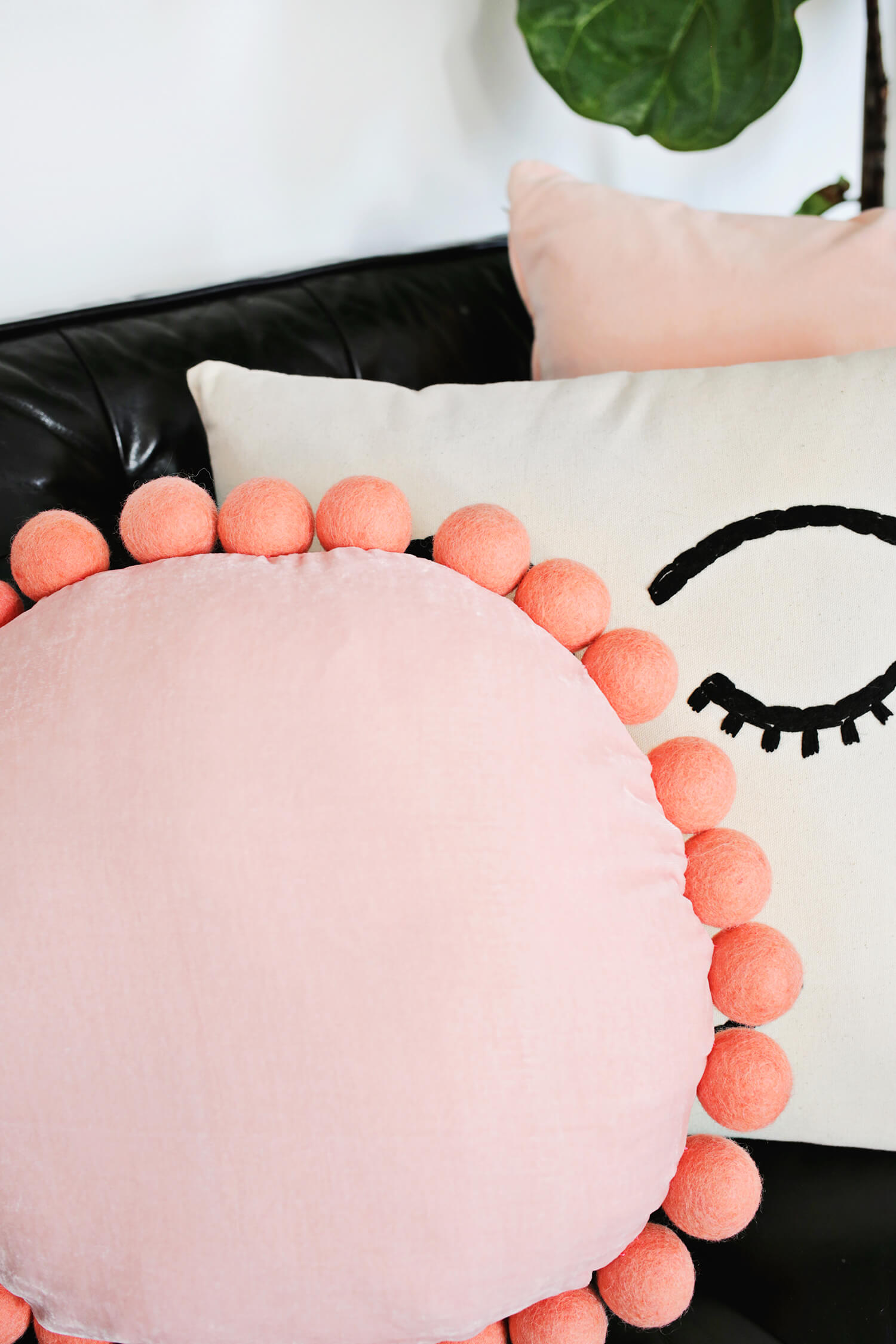 Adorable Round Felt Ball Pillow DIY (click through for tutorial)