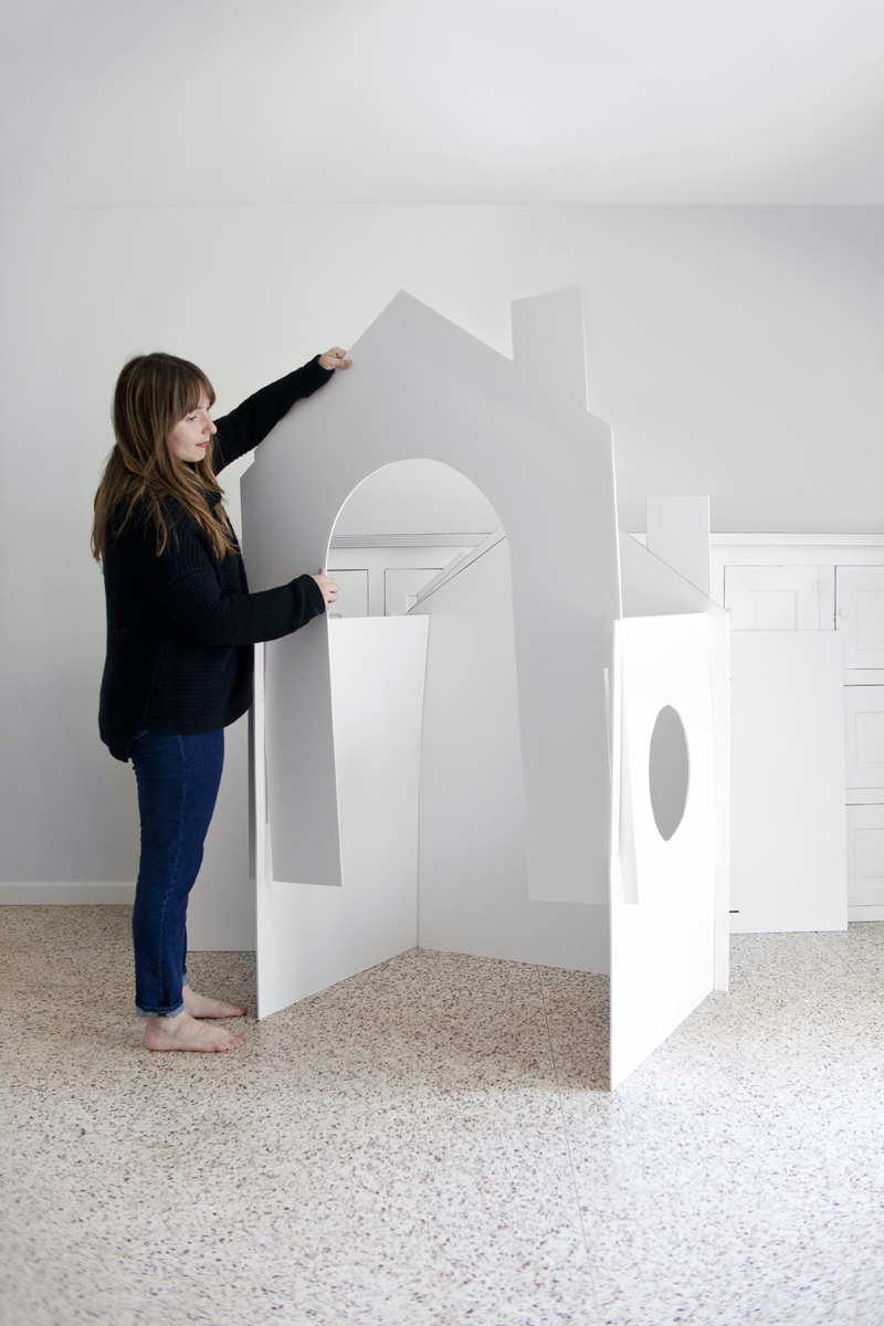 Make a collapsible playhouse out of cardboard, foamboard, or masonite
