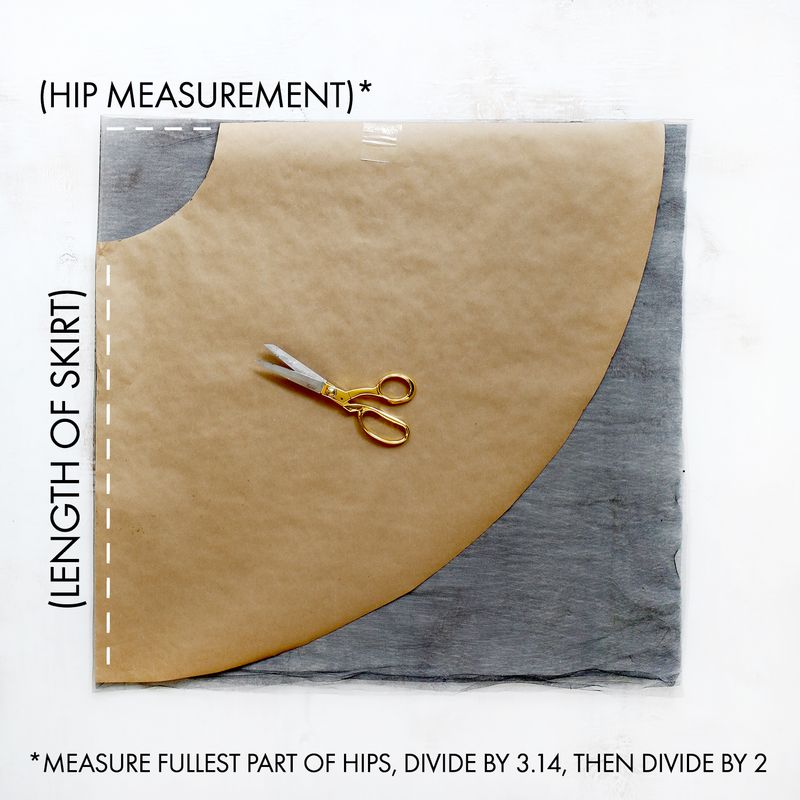 craft paper with gold scissors on top saying measure fullest part of hips, divide by 3.14, then divide by 2