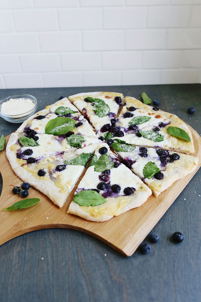 White sauce and blueberry pizza 