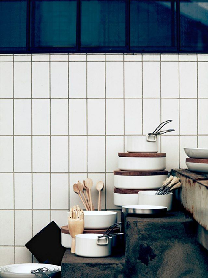 White Vertical Stack Bond tile with plates and utensils in front of it